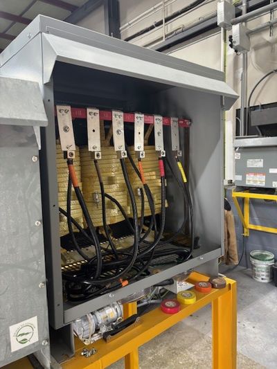 112.5 kVA three-phase dry-type transformer installation with secondary feeder connections