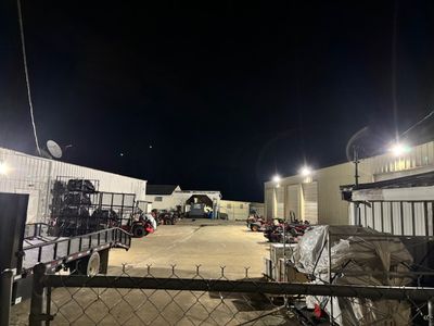 Commercial dealership entry view with upgraded exterior site lighting