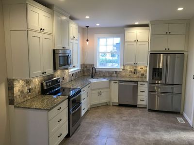 Full kitchen electrical upgrade with recessed lighting, pendant fixture, and appliance circuits