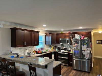 Kitchen remodel with upgraded receptacles, appliance circuits, and recessed lighting